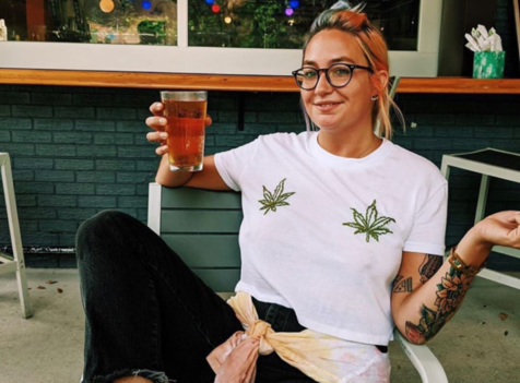 a customer enjoying a beer on dashi patio